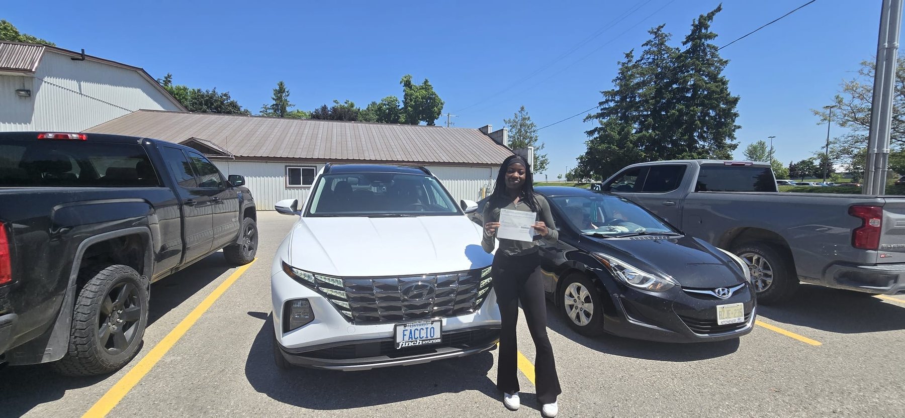 Student celebrating a successful road-test milestone